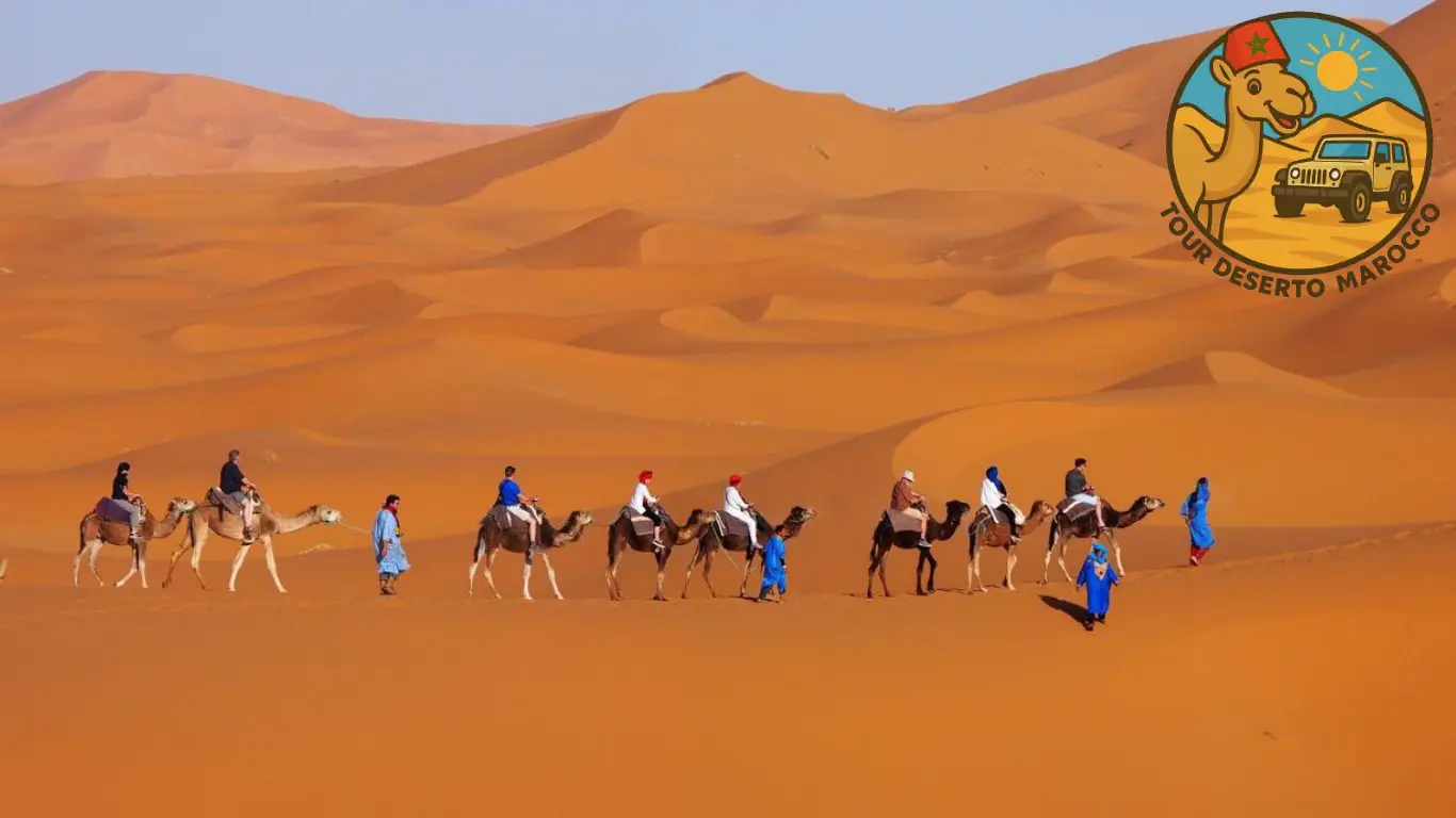 Carovana di cammelli al tramonto nelle dune di Merzouga Tour deserto Marocco 3 giorni da Marrakech a Merzouga con cammelli al tramonto tra le dune di Erg Chebbi